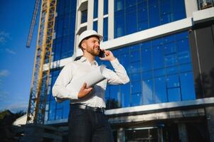 Portrait of an handsome engineer at work photo