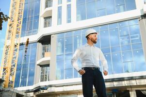 Portrait of an handsome engineer at work photo