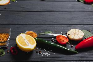 Cooking table. Background with spices and vegetables. Top view. Free space for your text photo