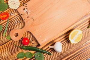 Cooking table. Background with spices and vegetables. Top view. Free space for your text photo