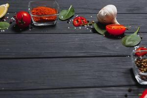 Cooking table. Background with spices and vegetables. Top view. Free space for your text photo