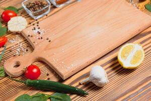 Cooking table. Background with spices and vegetables. Top view. Free space for your text photo