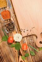 Cooking table. Background with spices and vegetables. Top view. Free space for your text photo