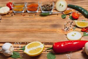 Cooking table. Background with spices and vegetables. Top view. Free space for your text photo