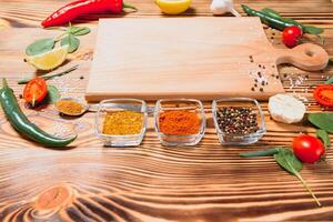 Cooking table. Background with spices and vegetables. Top view. Free space for your text photo