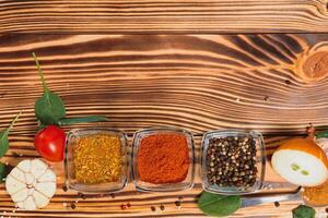 Cooking table. Background with spices and vegetables. Top view. Free space for your text photo