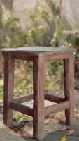 A lonely wooden stool in an abandoned room, capturing the devastation and decay video