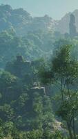A scenic view of a mountain with trees and rocks video