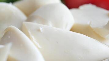 Fresh Mozzarella Cheese, soft and creamy Italian dairy used in cooking and as an appetizer video