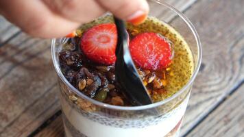 Nutritious Chia Seed Pudding with Granola and Strawberries is a healthy breakfast or dessert video