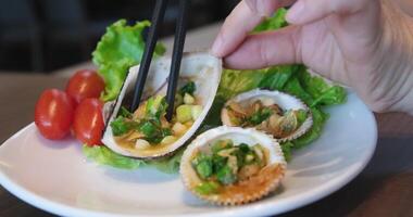 Get shellfish Baked mussels with garlic butter sauce and cilantro on top. video