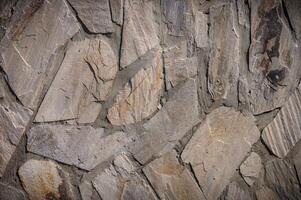 Wall of stones as a texture for background 7 photo