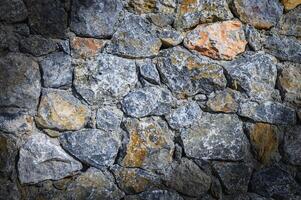 old wall of stone shell rock of arbitrary shape. isolated image photo