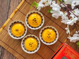 Top view Chinese pastry moon cake, salted egg lava, traditional desert photo