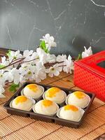Chinese pastry moon cake, salted egg lava, traditional desert photo