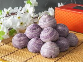 Closed up homemade Chinese pastry cake, stuffed bean and taro photo