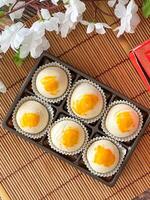 Top view Chinese pastry salted egg, traditional dessert flour and bean photo