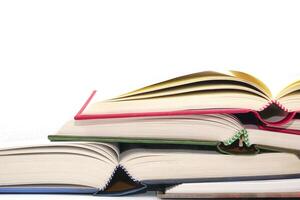 Stack of open books and stacked together. Knowledge and education concept. photo