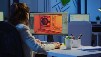 Woman game sotware developer testing new game overtime at night in start up creative agency company. Tired worker developing new online games on pc with modern technology video