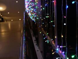 A close up photo of colorful twinkling lights
