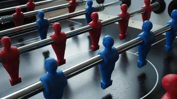 Football table or soccer table game with plastic player figurine. Mini Soccer game which famous in past and be collectable item for foosball lover. Play by two hand control each row of player figurine photo