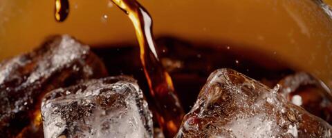 Cola soda and ice splashing fizzing or floating up to top of surface photo