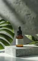Essential Oil Bottle on Cement Block photo