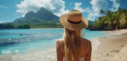 Woman Standing on Beach With Hat photo