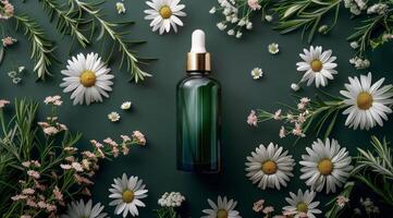 Bottle of Green Liquid Surrounded by Daisies photo