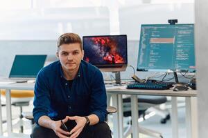 Programming. Man Working On Computer In IT Office, Sitting At Desk Writing Codes. Programmer Typing Data Code, Working On Project In Software Development Company photo