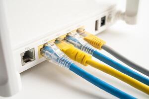 Ethernet cable with wireless router connect to internet service provider internet network. photo
