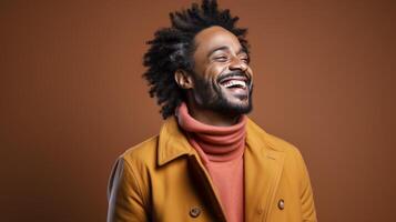 Smiling Man With Dreadlocks in Yellow Coat photo