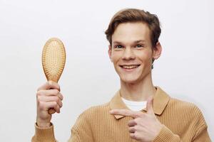 Stylish Men's Grooming. Handsome Guy with a Beard Enjoying a Clean Shave with a Razor in a Happy photo