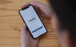 CHIANG MAI, THAILAND - JUNE 7, 2020. iPhone Xs with LinkedIn application on the screen. LinkedIn is a business-oriented social networking service photo