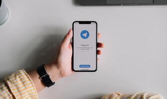 CHIANG MAI, THAILAND JULY 3 2020 . Telegram application icon on Apple iPhone Xs screen close-up. Telegram app icon. Telegram is an online social media network. Social media app photo