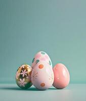 Painted pink and gold Easter eggs on a turquoise background, Happy Easter day concept and idea, copy space photo