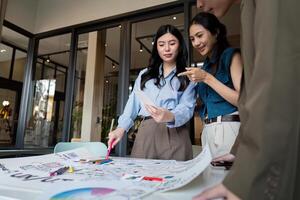 ux developer and ui designer presenting mobile app interface design on whiteboard in meeting at office. Creative digital development mobile app agency. digital transformation photo