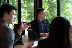 diversity Business People Planning Strategy Analysis from financial document report, Office Concept. photo