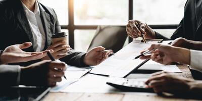 Business team meeting and presenting business results discussion and analysis data chart and graph, finance and accounting. Business performance concept. photo