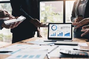Business team meeting and presenting business results discussion and analysis data chart and graph, finance and accounting. Business performance concept photo