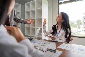 Business collaboration discussion working analyzing with financial data and marketing growth report graph in team, brainstorming to strategy planning making profit of company photo