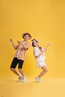 Portrait image of couple posing on yellow background, summer, travel photo