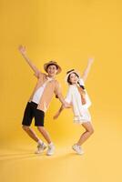 Portrait image of couple posing on yellow background, summer, travel photo