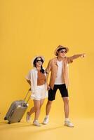 Portrait image of couple posing on yellow background, summer, travel photo