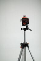 Laser level on a tripod for measurement photo