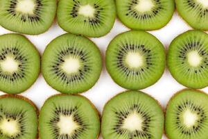 Sliced kiwi. Kiwi texture or background. Kiwi pattern photo