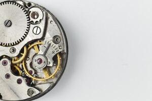 Clockwork close up. The clock mechanism close-up. Old Clock Watch Mechanism photo