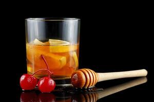 Lemon cocktail with cherry, honey and ice. Iced drinks photo