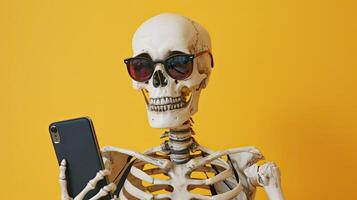 Skeleton with phone in hand. Halloween illustration, skull and bone with mobile smartphone. photo