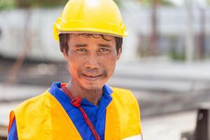 Portrait of factory worker man in hard hat at the precast factory site, Worker man on construction site photo